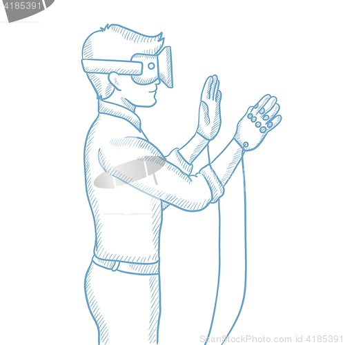 Image of Man wearing virtual reality headset.