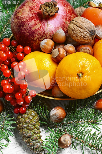 Image of Christmas still life with citrus