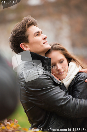 Image of Autumn portrait of attractive happy couple