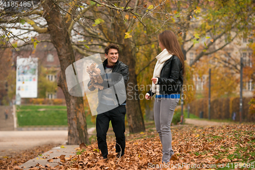 Image of Happy young Couple in Autumn Park