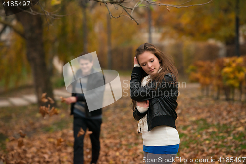 Image of Happy young Couple in Autumn Park