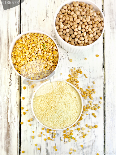 Image of Flour pea and split pease in three bowls on board top