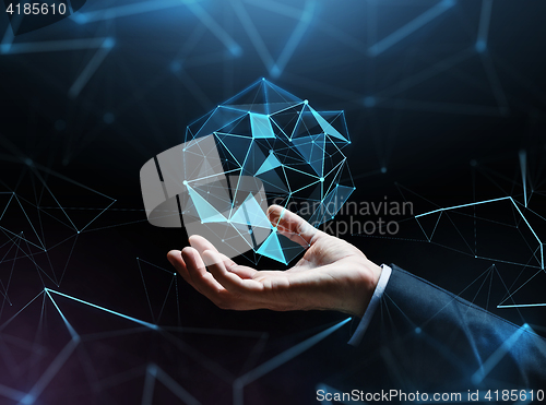 Image of close up of businessman hand with hologram