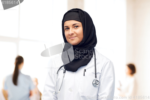 Image of muslim female doctor in hijab with stethoscope