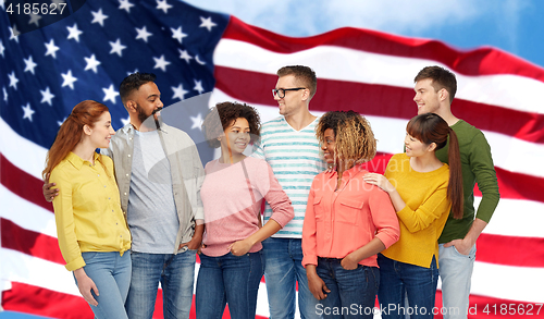 Image of international group of people over american flag