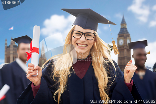 Image of happy student with diploma celebrating graduation