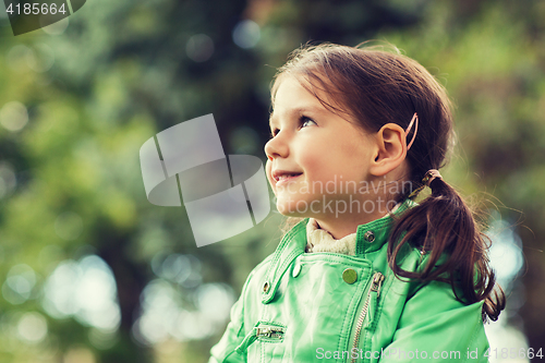 Image of happy beautiful little girl portrait outdoors