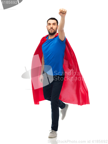 Image of man in red superhero cape