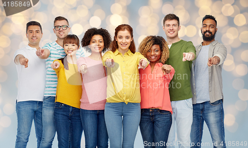Image of international group of people pointing on you