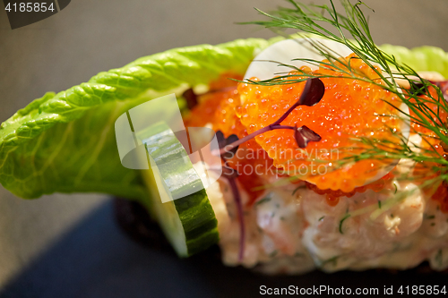 Image of close up of toast skagen with caviar and bread