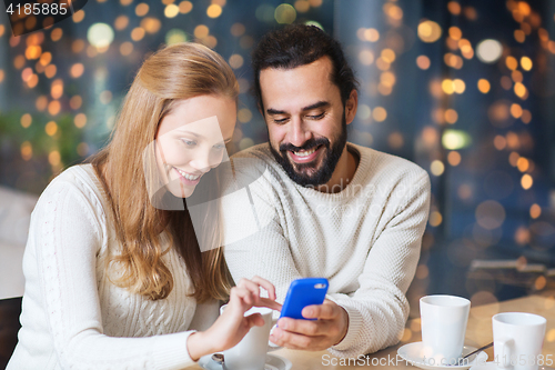 Image of happy couple with tablet pc and coffee at cafe