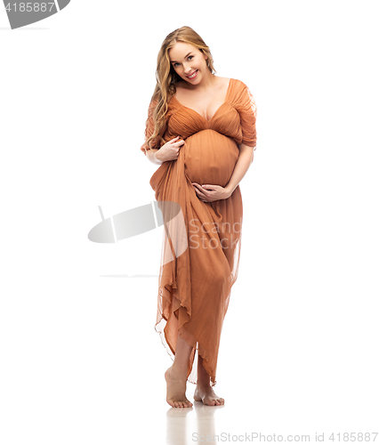 Image of happy pregnant woman touching her big belly