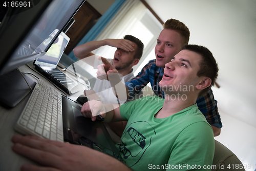 Image of a group of graphic designers at work