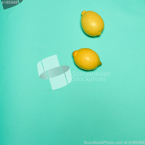 Image of Lemons on blue background