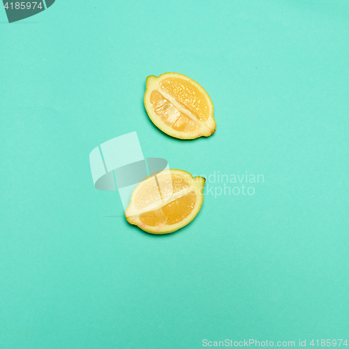 Image of Lemons on green background