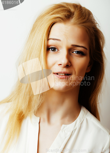 Image of young blond woman on white backgroung gesture thumbs up, isolate