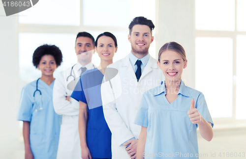 Image of group of doctors and nurses at hospital