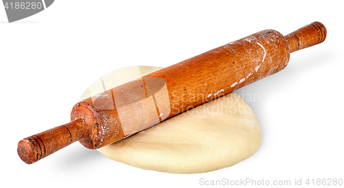 Image of Rolling pin on piece of dough