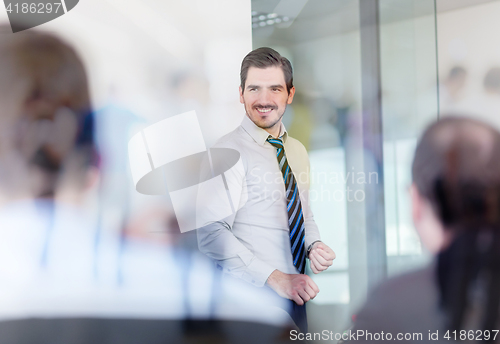 Image of Relaxed informal business team office meeting.