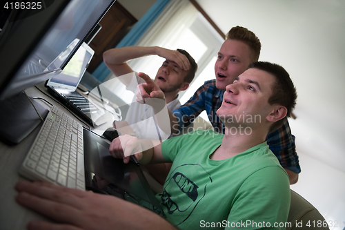 Image of a group of graphic designers at work