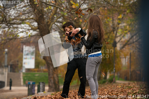 Image of Happy young Couple in Autumn Park