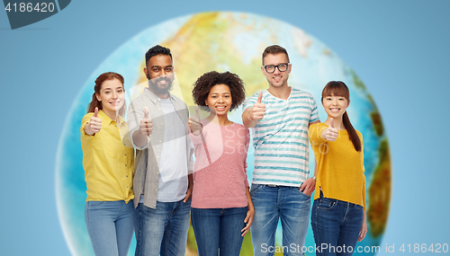 Image of international group of people showing thumbs up