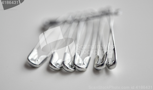 Image of many safety pins