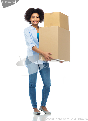 Image of happy african young woman with parcel boxes