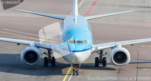 Image of SCHIPHOL, AMSTERDAM, JULY 19, 2016: Front view of a KLM plane at