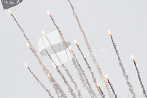 Image of Flares with a trial of smoke