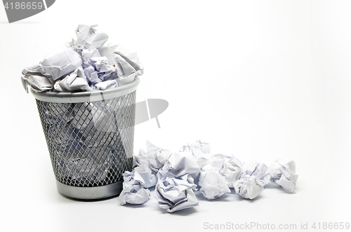 Image of Garbage bin with paper waste