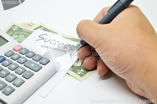 Image of Hand written success word on paper