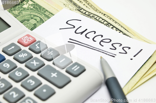 Image of Hand written success word on paper