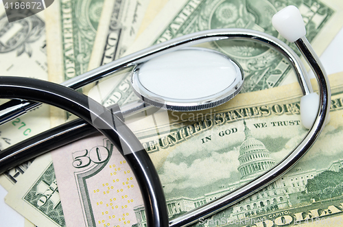 Image of US dollar and stethoscope