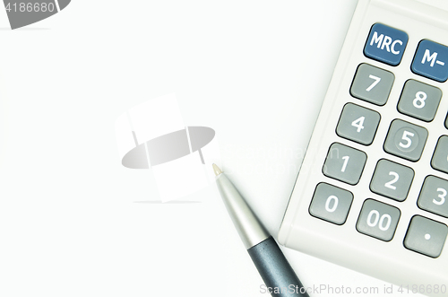 Image of Calculator and pen isolated on white