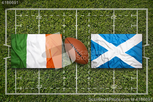 Image of Ireland vs. Scotland\r\rIreland vs. Scotland flags on rugby field