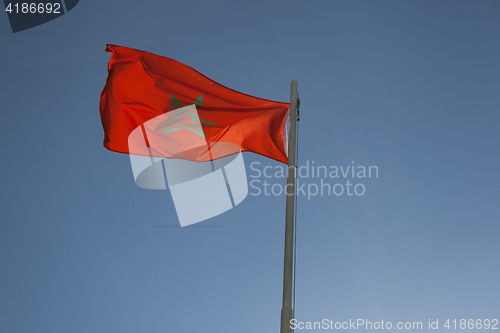 Image of National flag of Morocco on a flagpole