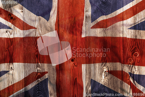 Image of National flag of United Kingdom, wooden background