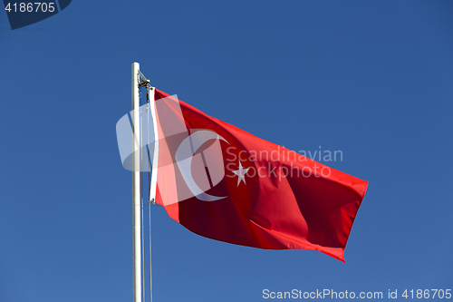 Image of National flag of Turkey on a flagpole