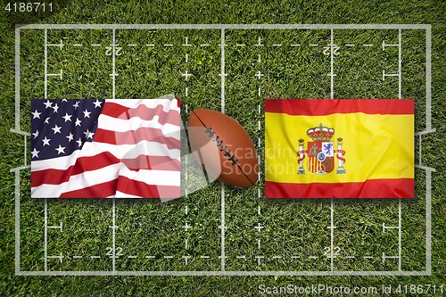 Image of USA vs. Spain flags on rugby field