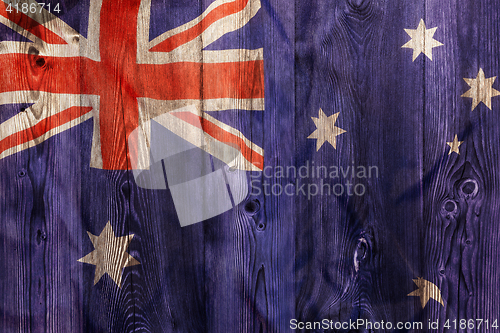 Image of National flag of Australia, wooden background