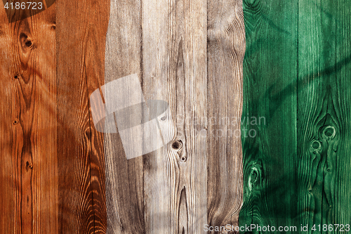 Image of National flag of Ivory Coast, wooden background