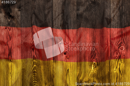 Image of National flag of Germany, wooden background