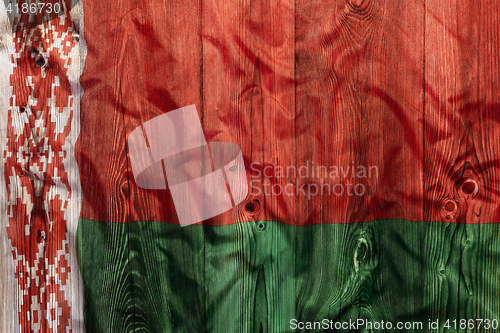 Image of National flag of Belarus, wooden background