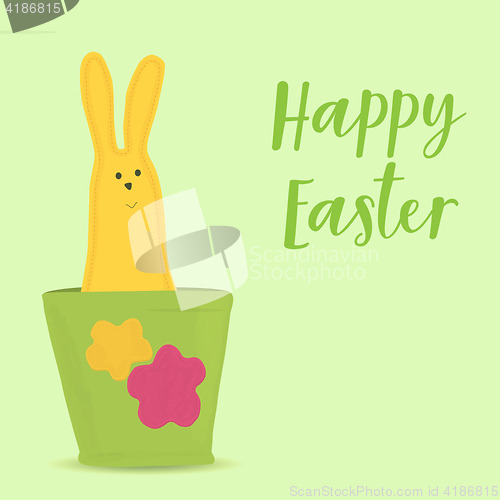 Image of Easter bunny sitting in pot