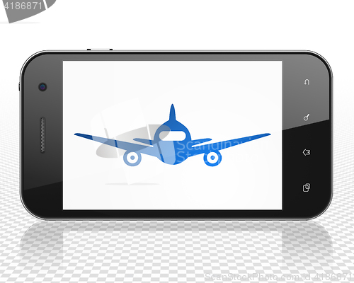 Image of Travel concept: Smartphone with Aircraft on display