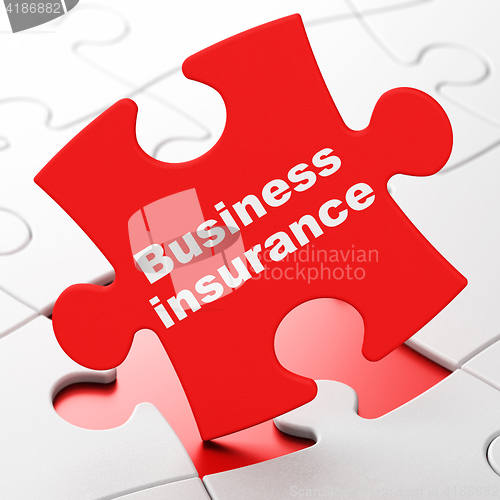 Image of Insurance concept: Business Insurance on puzzle background