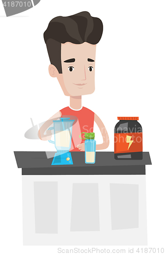 Image of Young man making protein cocktail.