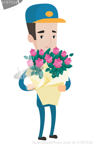 Image of Delivery courier holding bouquet of flowers.