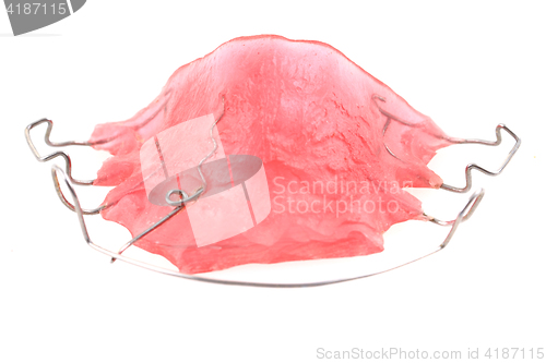 Image of pink braces isolated